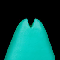 Massageador sensual Monster D em formato de concha com pressão suave e controlada
